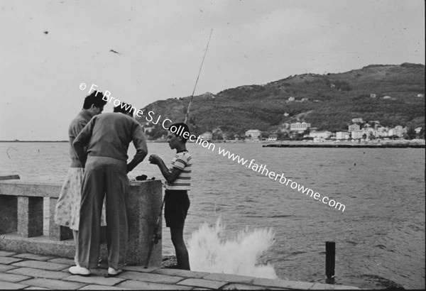 FISHERBOY ON PIER